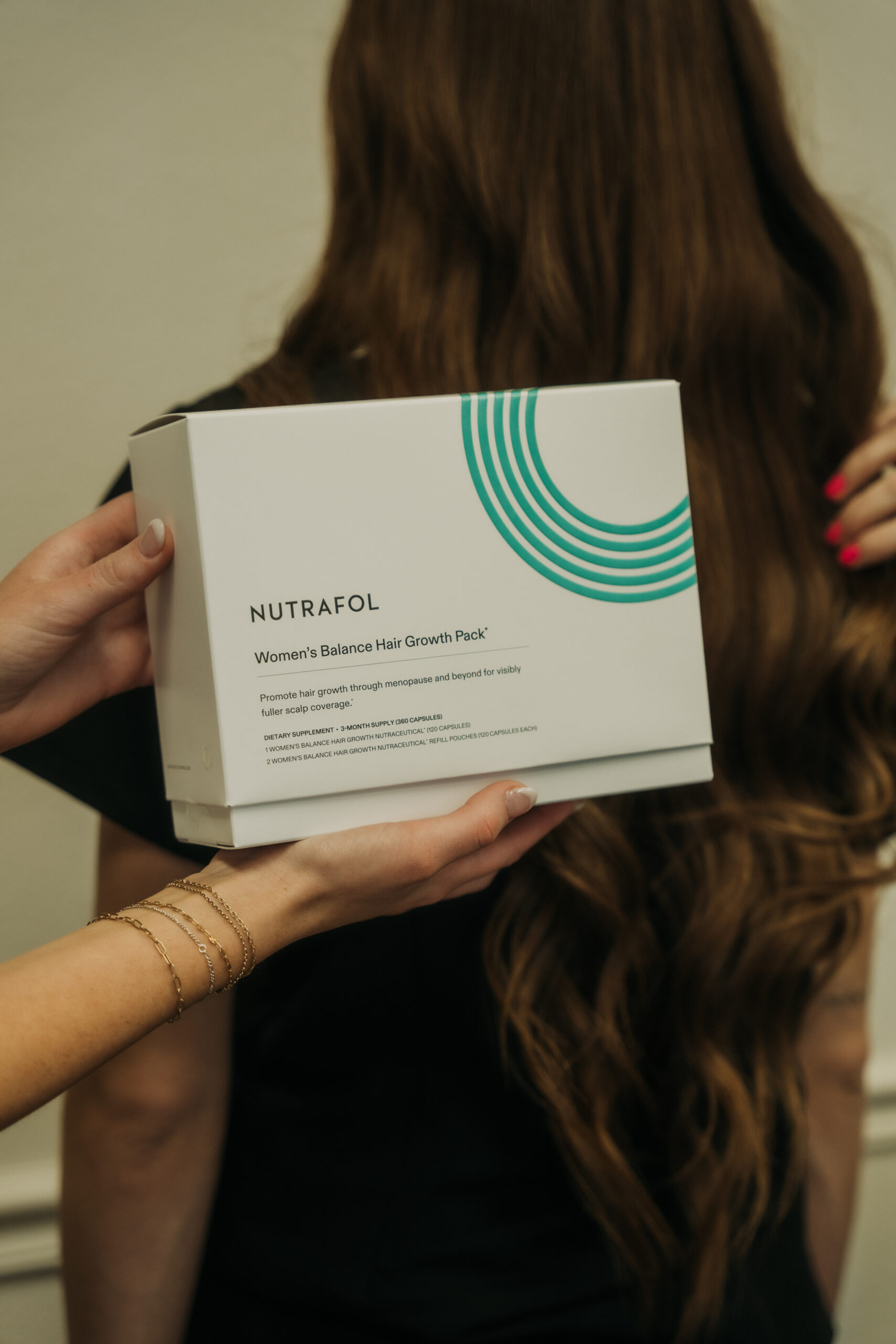 Nutrafol hair supplements displayed at Revival
